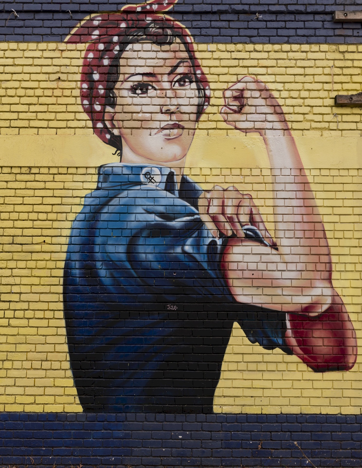 Rosie the riveter on wall